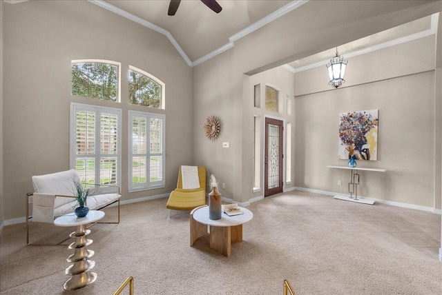 2512 Garnetfield Ln, Friendswood, TX 77546 - sitting room with ornamental molding, baseboards, ceiling fan, high vaulted ceiling, and carpet flooring