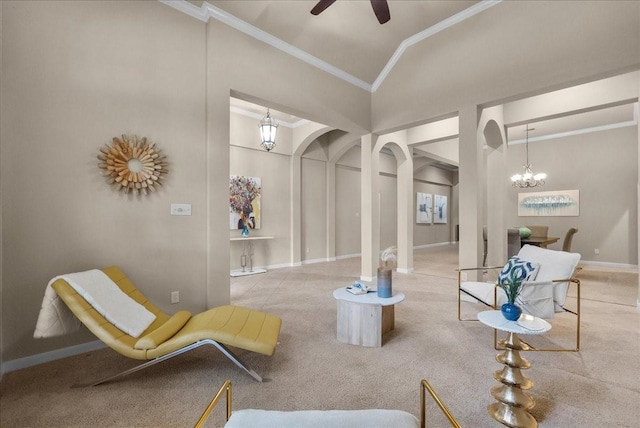 2512 Garnetfield Ln, Friendswood, TX 77546 - living area featuring ornamental molding, arched walkways, ceiling fan, carpet, and a chandelier