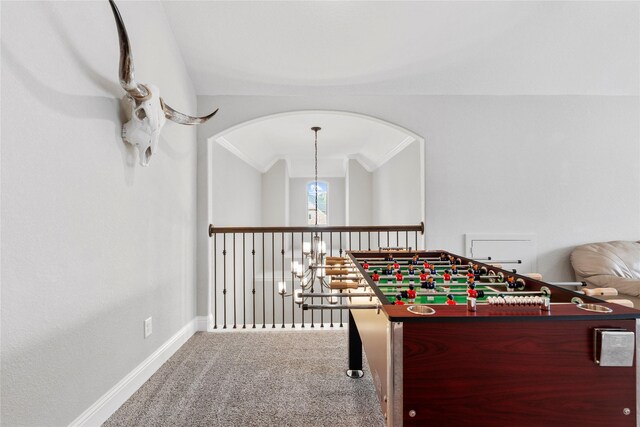 315 Lagarto Way, Pinehurst, TX 77362 - recreation room with carpet flooring, baseboards, and ornamental molding