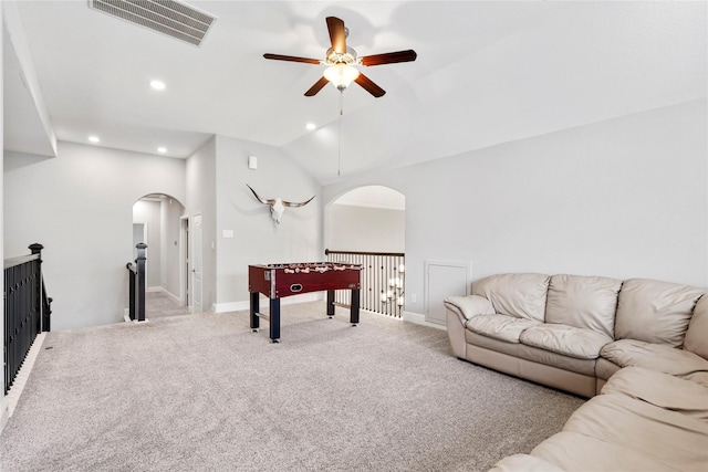 315 Lagarto Way, Pinehurst, TX 77362 - recreation room with arched walkways, ceiling fan, carpet, recessed lighting, and lofted ceiling