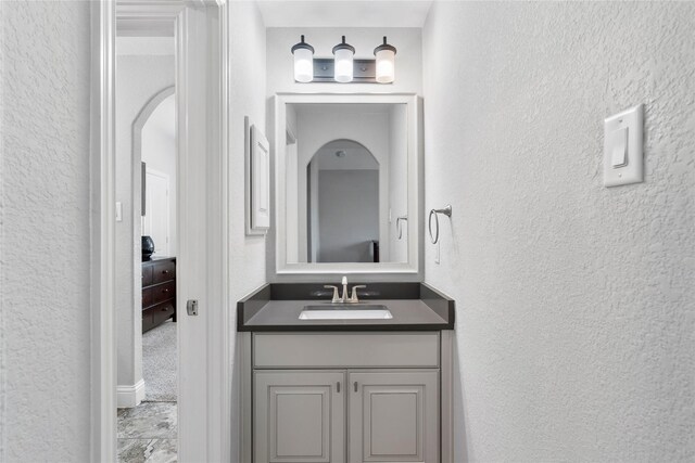 315 Lagarto Way, Pinehurst, TX 77362 - bathroom with a textured wall and vanity