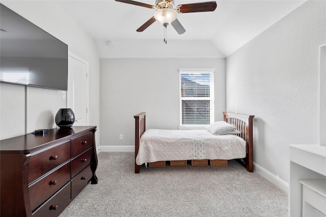 315 Lagarto Way, Pinehurst, TX 77362 - bedroom with light carpet, baseboards, vaulted ceiling, and a ceiling fan