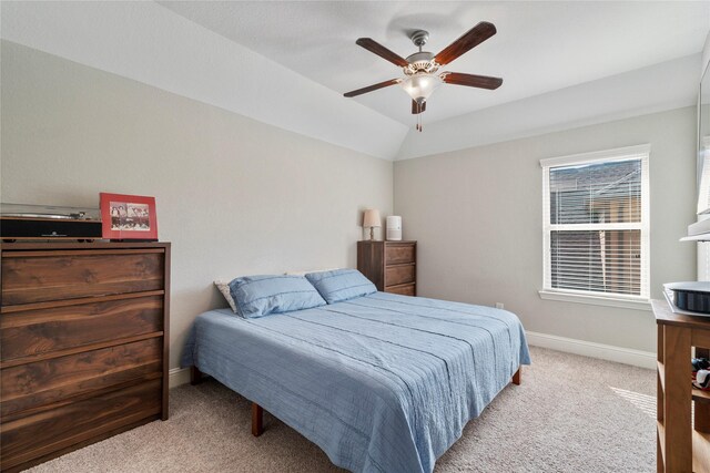 315 Lagarto Way, Pinehurst, TX 77362 - bedroom featuring carpet flooring, baseboards, ceiling fan, and lofted ceiling