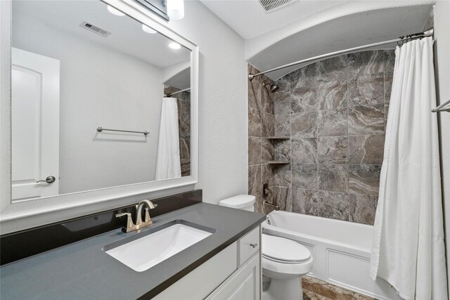 315 Lagarto Way, Pinehurst, TX 77362 - full bath featuring vanity, toilet, and shower / bath combo with shower curtain
