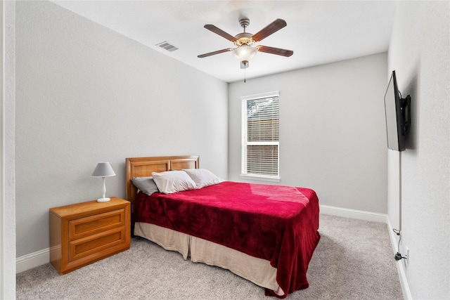 315 Lagarto Way, Pinehurst, TX 77362 - bedroom with carpet flooring, baseboards, and a ceiling fan