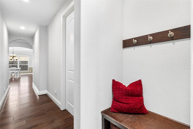 315 Lagarto Way, Pinehurst, TX 77362 - mudroom with dark wood-type flooring, arched walkways, baseboards, a chandelier, and recessed lighting