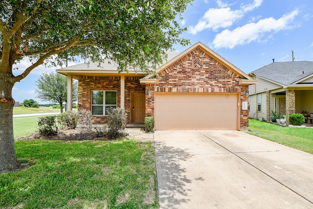 20722 Raven Mist Ct, Katy, TX 77449 - view of front of property with brick siding, an attached garage, a front yard, and concrete driveway