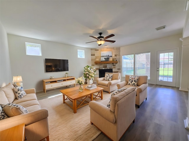 6415 Taimer Ct, Sugar Land, TX 77479 - living area featuring healthy amount of natural light, ceiling fan, and wood finished floors