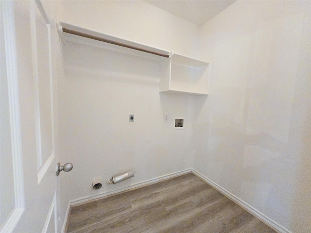 6415 Taimer Ct, Sugar Land, TX 77479 - washroom with wood finished floors, washer hookup, hookup for an electric dryer, hookup for a gas dryer, and baseboards