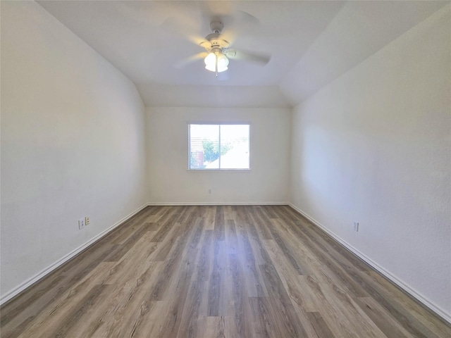 6415 Taimer Ct, Sugar Land, TX 77479 - spare room with wood finished floors, ceiling fan, and baseboards