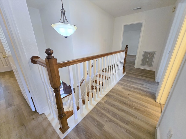 6415 Taimer Ct, Sugar Land, TX 77479 - staircase with wood finished floors