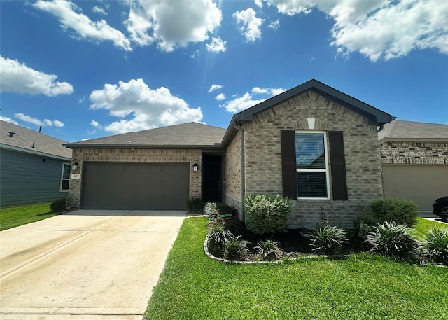 4827 Austin Meadow Ln, Katy, TX 77449 - single story home with an attached garage, driveway, a front yard, and brick siding