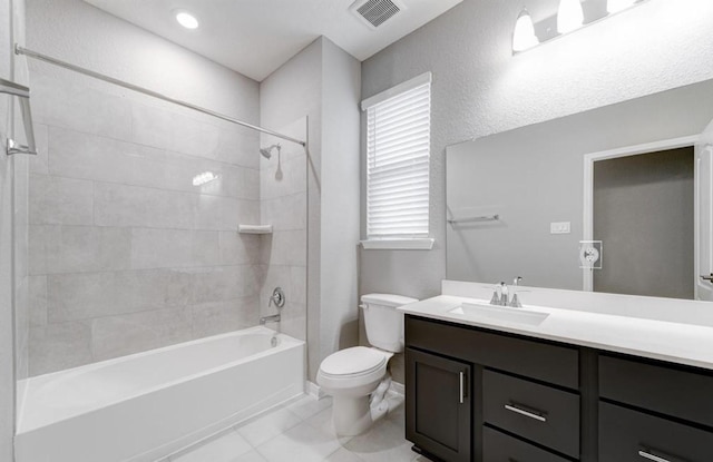 4827 Austin Meadow Ln, Katy, TX 77449 - bathroom featuring toilet, vanity, and washtub / shower combination