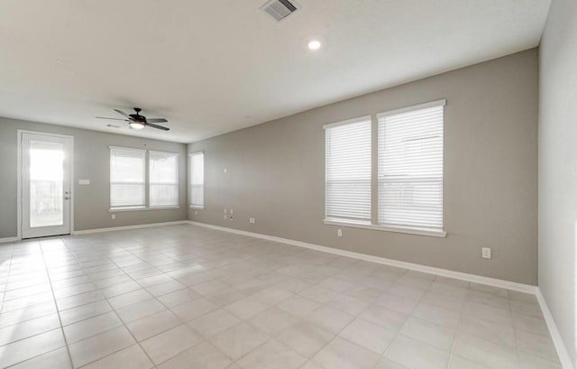 4827 Austin Meadow Ln, Katy, TX 77449 - unfurnished room with ceiling fan, baseboards, and light tile patterned floors