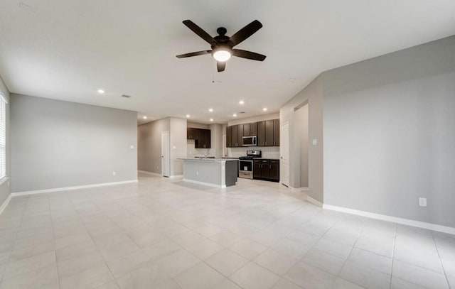 4827 Austin Meadow Ln, Katy, TX 77449 - unfurnished living room with recessed lighting, ceiling fan, and baseboards