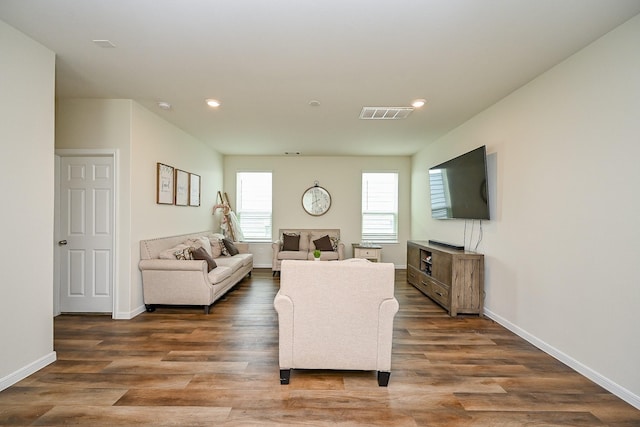 4611 Prairie Chase Dr, Houston, TX 77069 - living area featuring recessed lighting, wood finished floors, and baseboards