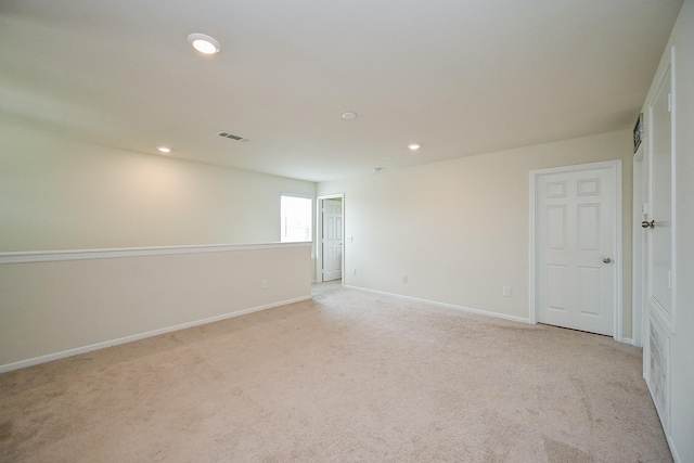 4611 Prairie Chase Dr, Houston, TX 77069 - empty room featuring recessed lighting, light carpet, and baseboards