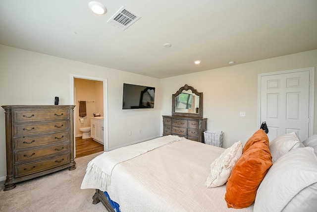 4611 Prairie Chase Dr, Houston, TX 77069 - bedroom featuring light colored carpet, baseboards, ensuite bathroom, and recessed lighting