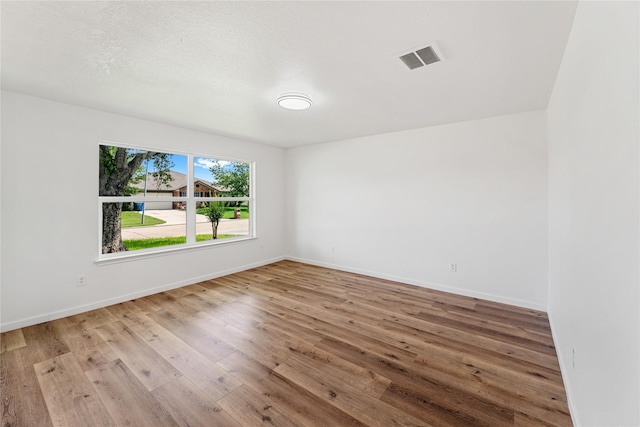 7815 Brook Trail Cir, Houston, TX 77040 - empty room featuring hardwood / wood-style flooring and baseboards