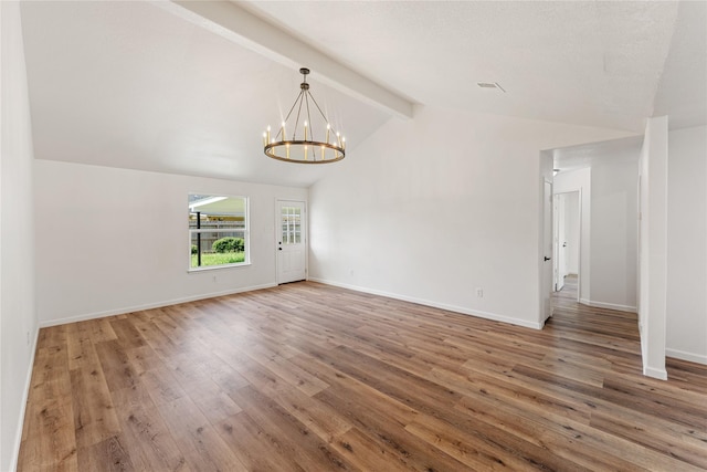 7815 Brook Trail Cir, Houston, TX 77040 - spare room featuring a chandelier, wood finished floors, and baseboards