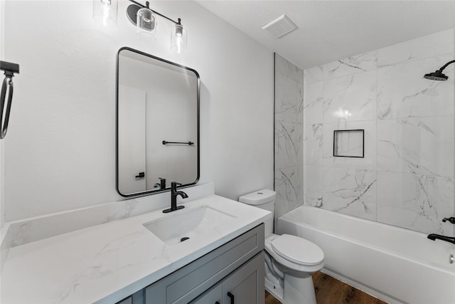 7815 Brook Trail Cir, Houston, TX 77040 - full bath featuring vanity, toilet, washtub / shower combination, and wood finished floors