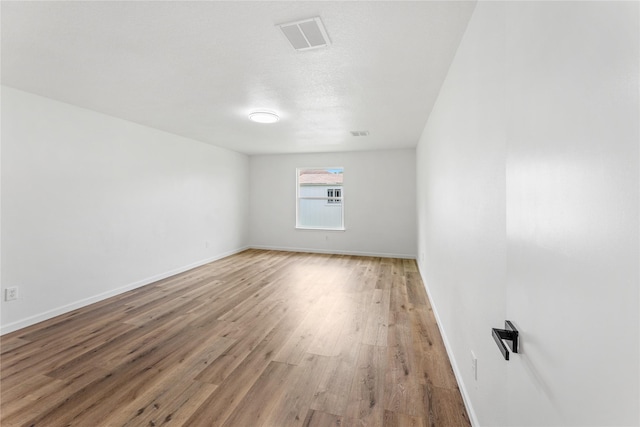 7815 Brook Trail Cir, Houston, TX 77040 - spare room with light wood-style floors and baseboards
