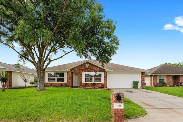 7815 Brook Trail Cir, Houston, TX 77040 - single story home with a garage, concrete driveway, a front yard, brick siding, and roof with shingles