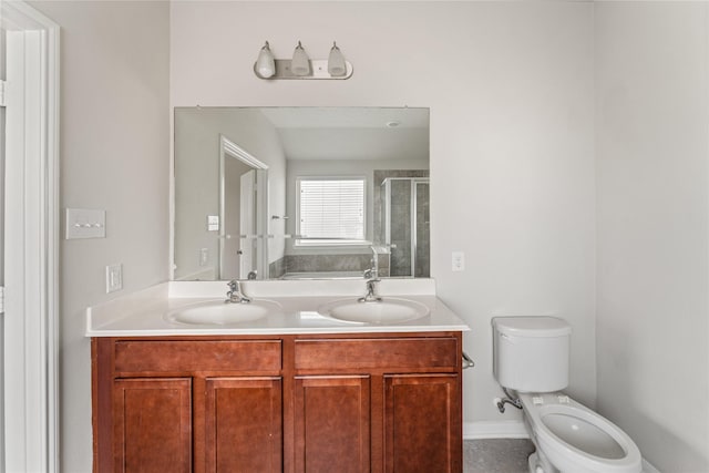 8014 Oxbow Manor Ln, Cypress, TX 77433 - full bath with a stall shower, toilet, double vanity, and baseboards