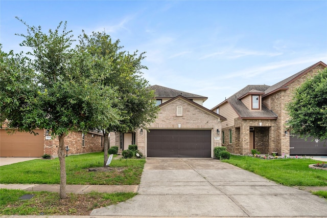 8014 Oxbow Manor Ln, Cypress, TX 77433 - view of front of house with a garage, concrete driveway, brick siding, and a front lawn