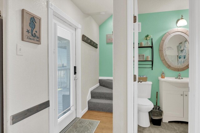 123 Howard Ave, Surfside Beach, TX 77541 - full bath with vanity, toilet, and baseboards