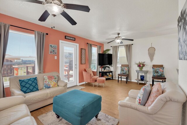 123 Howard Ave, Surfside Beach, TX 77541 - living area featuring a ceiling fan and light wood finished floors