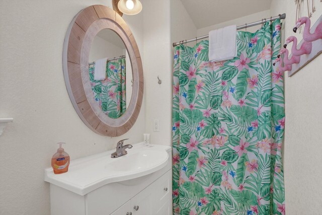 123 Howard Ave, Surfside Beach, TX 77541 - full bath featuring vanity and a shower with curtain