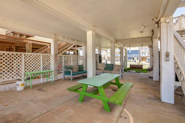 123 Howard Ave, Surfside Beach, TX 77541 - view of patio with stairway and an outdoor hangout area