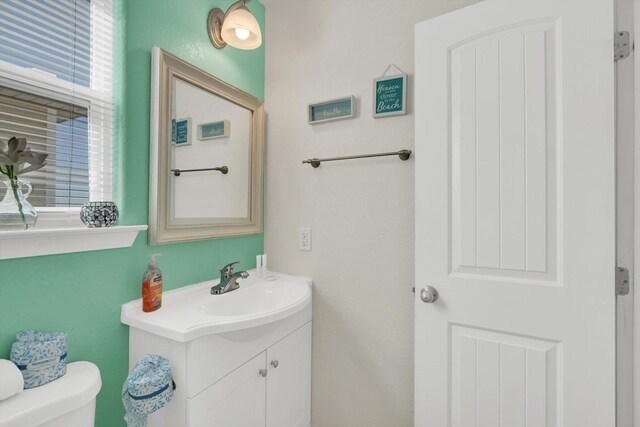 123 Howard Ave, Surfside Beach, TX 77541 - bathroom with vanity and toilet