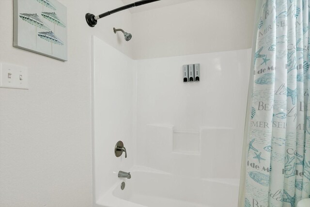123 Howard Ave, Surfside Beach, TX 77541 - full bathroom with shower / bathtub combination with curtain