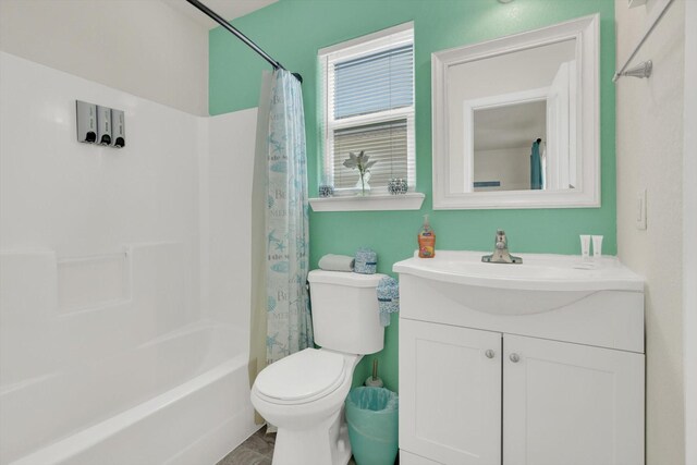 123 Howard Ave, Surfside Beach, TX 77541 - bathroom featuring toilet, vanity, and shower / bathtub combination with curtain