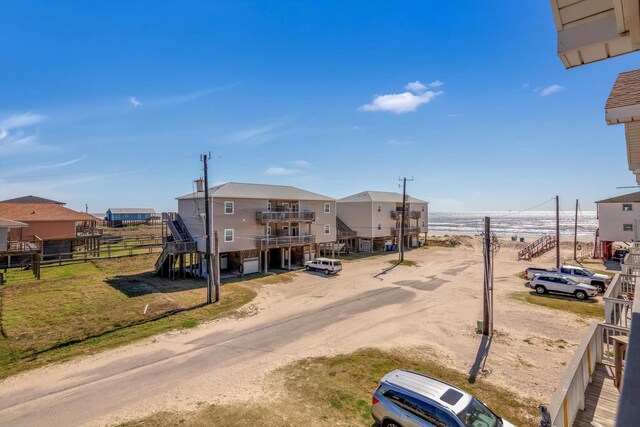 123 Howard Ave, Surfside Beach, TX 77541 - view of dirt / gravel road featuring a residential view