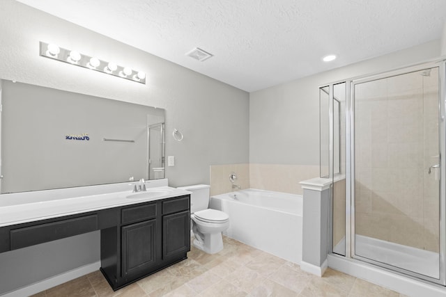 16606 Burnell Oaks Ln, Houston, TX 77090 - full bath featuring vanity, a bath, a stall shower, a textured ceiling, and toilet