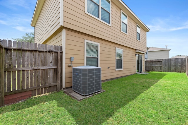 16606 Burnell Oaks Ln, Houston, TX 77090 - rear view of property featuring cooling unit