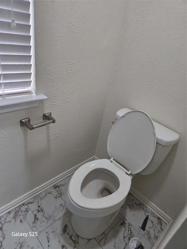 16111 Aberdeen Forest Dr, Houston, TX 77095 - bathroom with marble finish flooring and toilet