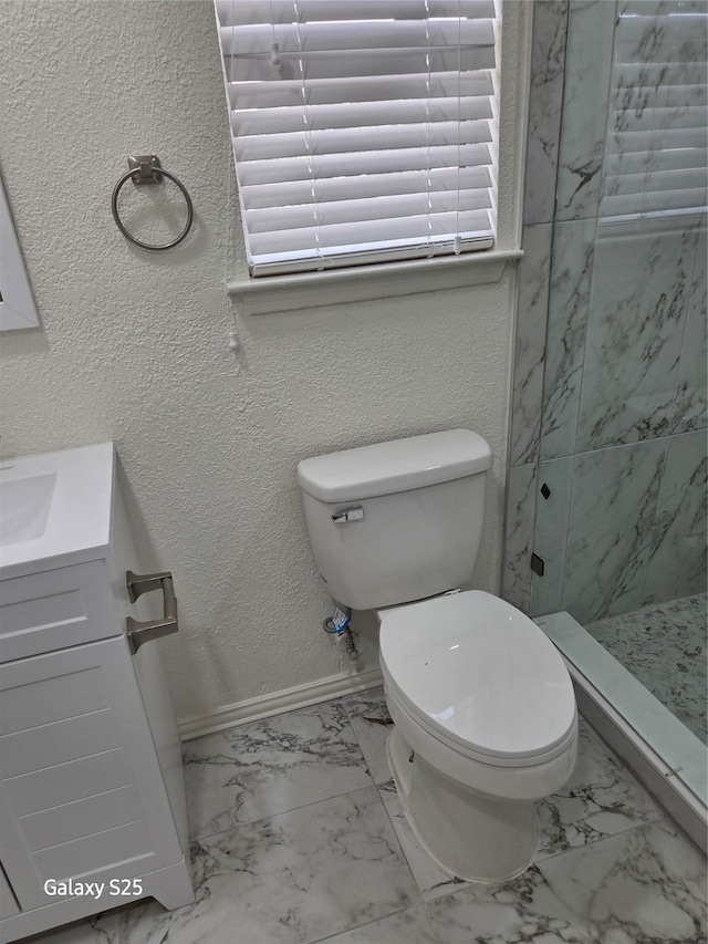 16111 Aberdeen Forest Dr, Houston, TX 77095 - full bath with marble look tile flooring, vanity, toilet, and a stall shower