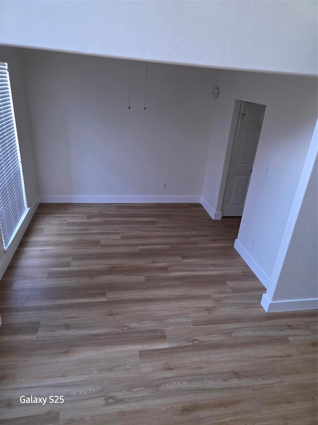 16111 Aberdeen Forest Dr, Houston, TX 77095 - empty room with wood finished floors and baseboards