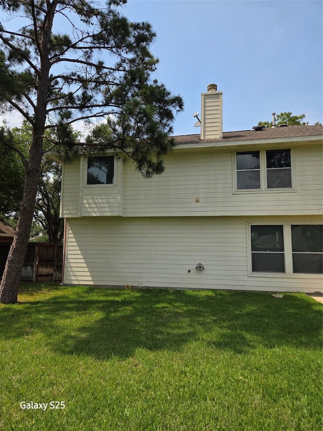 16111 Aberdeen Forest Dr, Houston, TX 77095 - rear view of house with a chimney