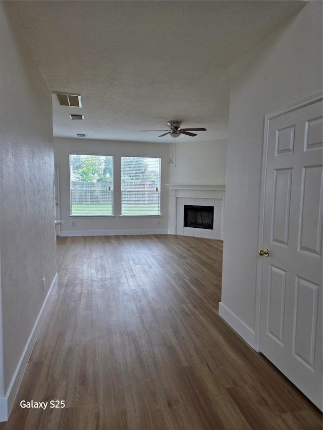 16111 Aberdeen Forest Dr, Houston, TX 77095 - unfurnished living room featuring wood finished floors and baseboards