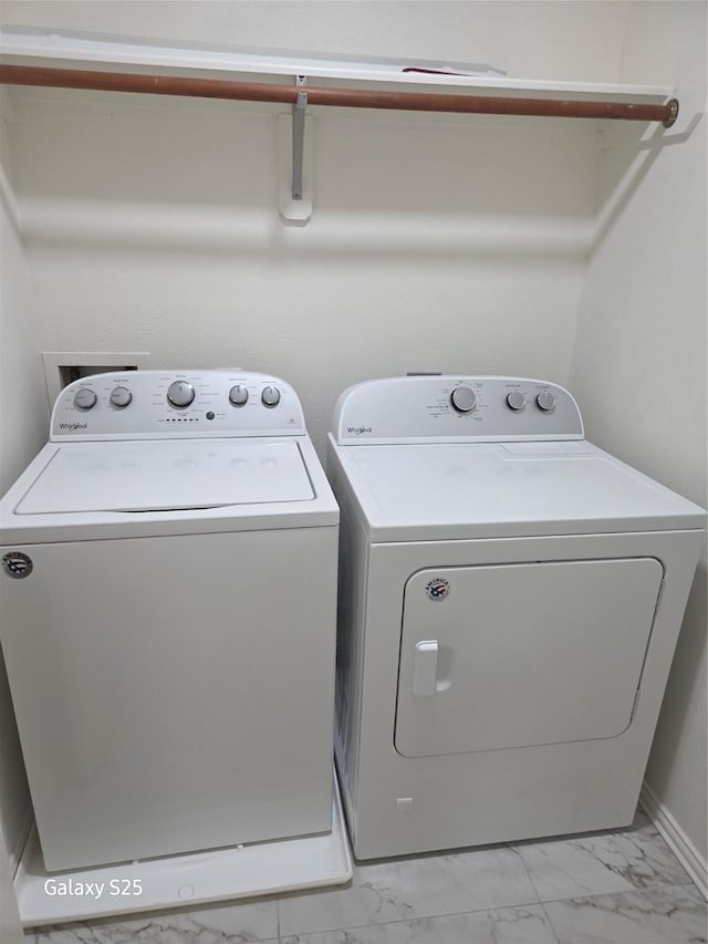 16111 Aberdeen Forest Dr, Houston, TX 77095 - laundry area featuring light marble finish floors and independent washer and dryer