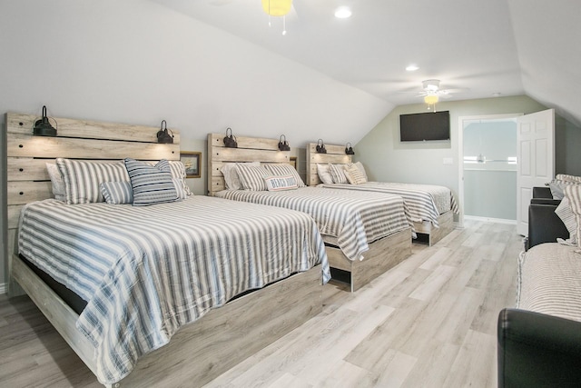 1214 Hwy 87, Gilchrist, TX 77617 - bedroom featuring vaulted ceiling, wood finished floors, ceiling fan, recessed lighting, and baseboards