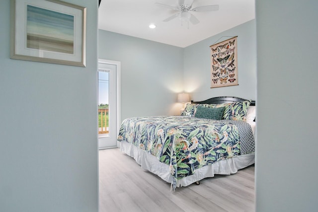 1214 Hwy 87, Gilchrist, TX 77617 - bedroom featuring wood finished floors and ceiling fan