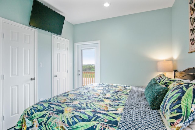1214 Hwy 87, Gilchrist, TX 77617 - bedroom featuring access to exterior and recessed lighting