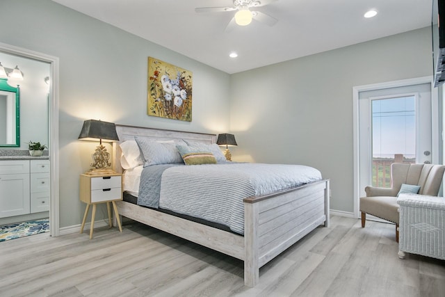 1214 Hwy 87, Gilchrist, TX 77617 - bedroom with light wood finished floors, baseboards, connected bathroom, and recessed lighting