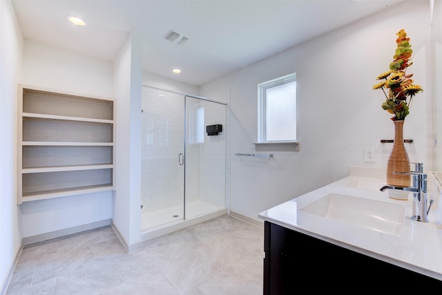 29751 Cayenne Cir, Katy, TX 77494 - bathroom featuring vanity, a shower stall, baseboards, and recessed lighting